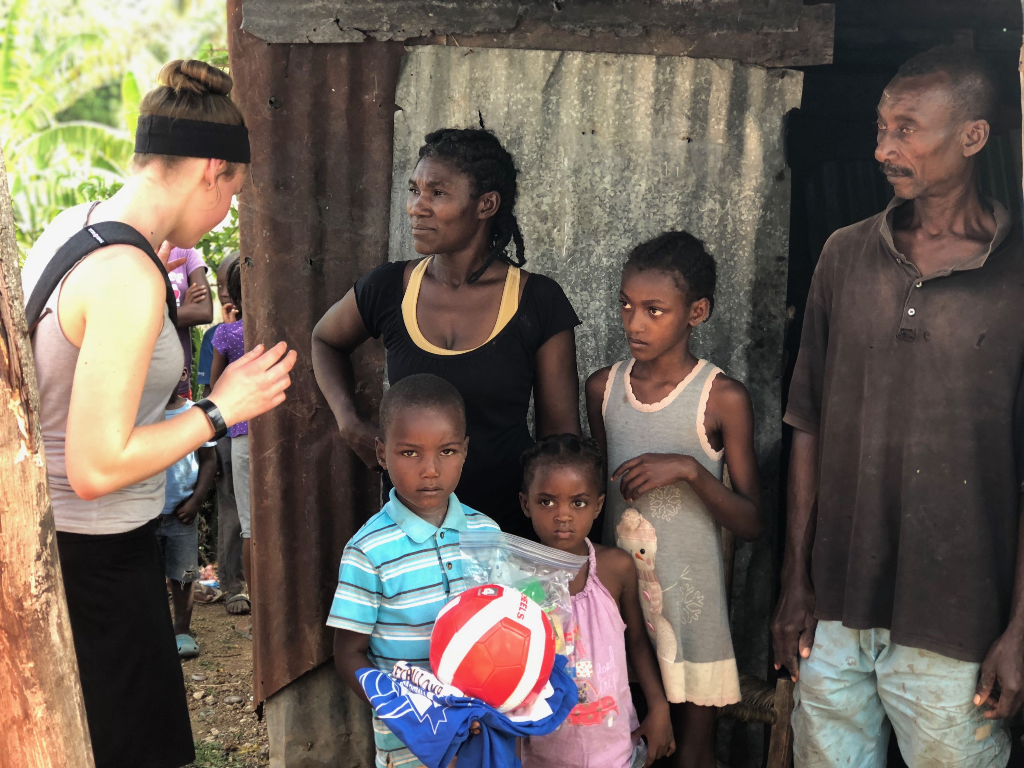 Lauren delivers a care package to a family that she sponsors.